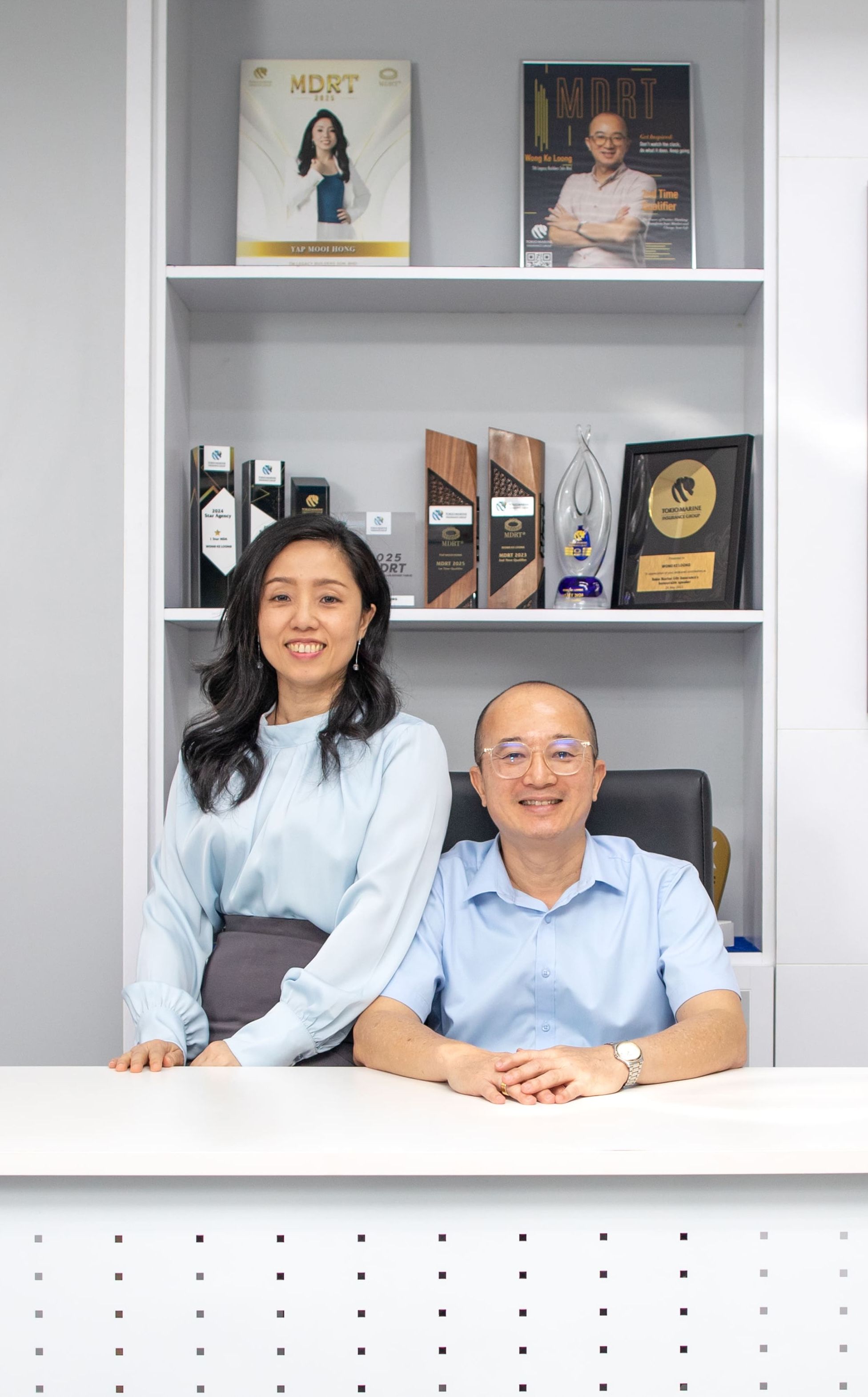 Staff member of TM Legacy Builders, Mr.Wong Ke Loong and Ms. Yap Mooi Hong